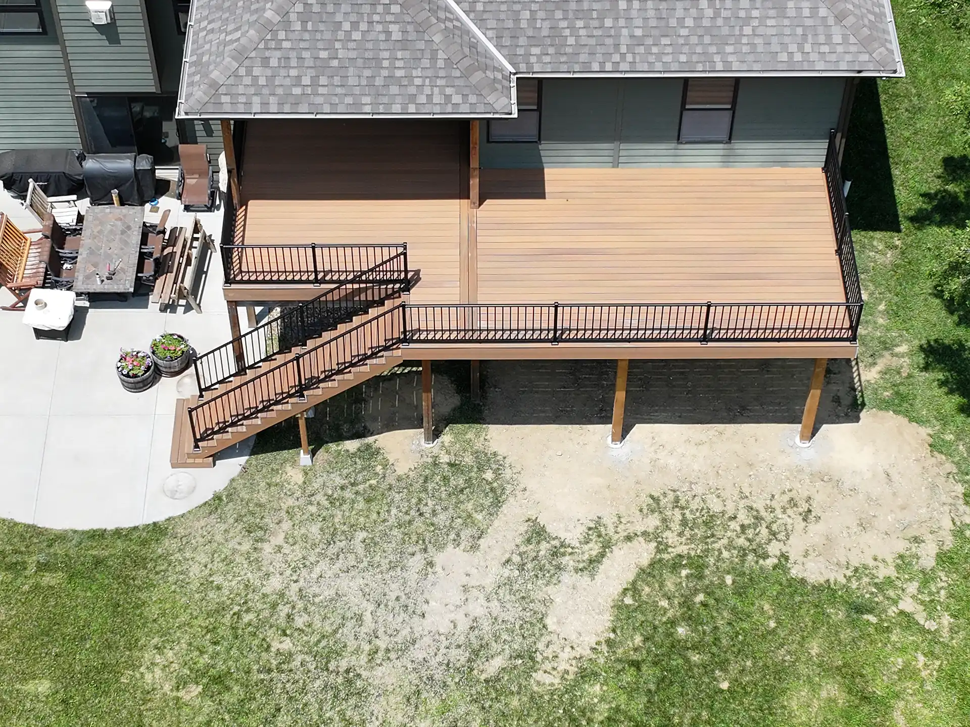 photo of an Elevated Composite Deck with black railings