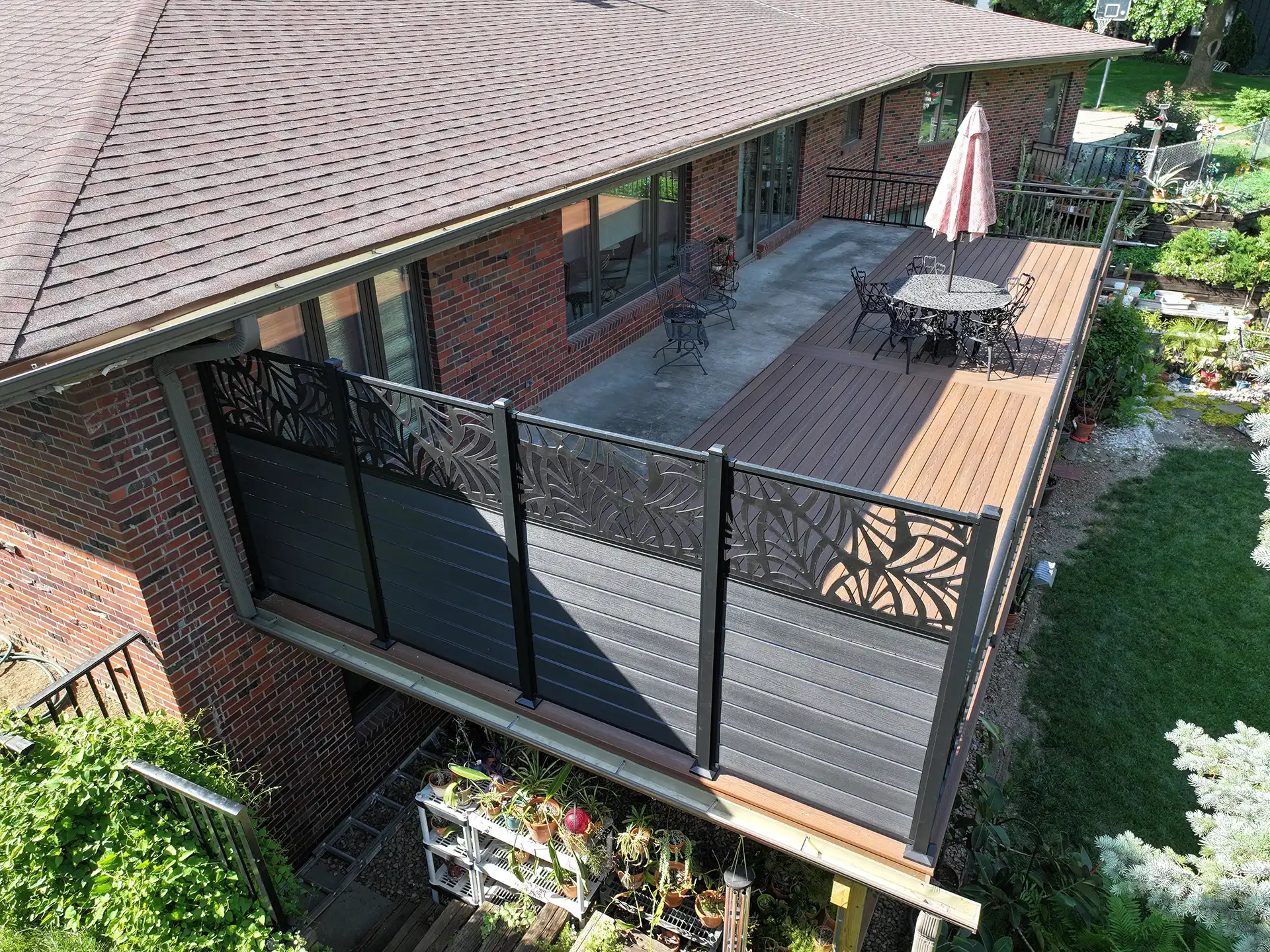 Elevated composite deck with privacy screens in Omaha