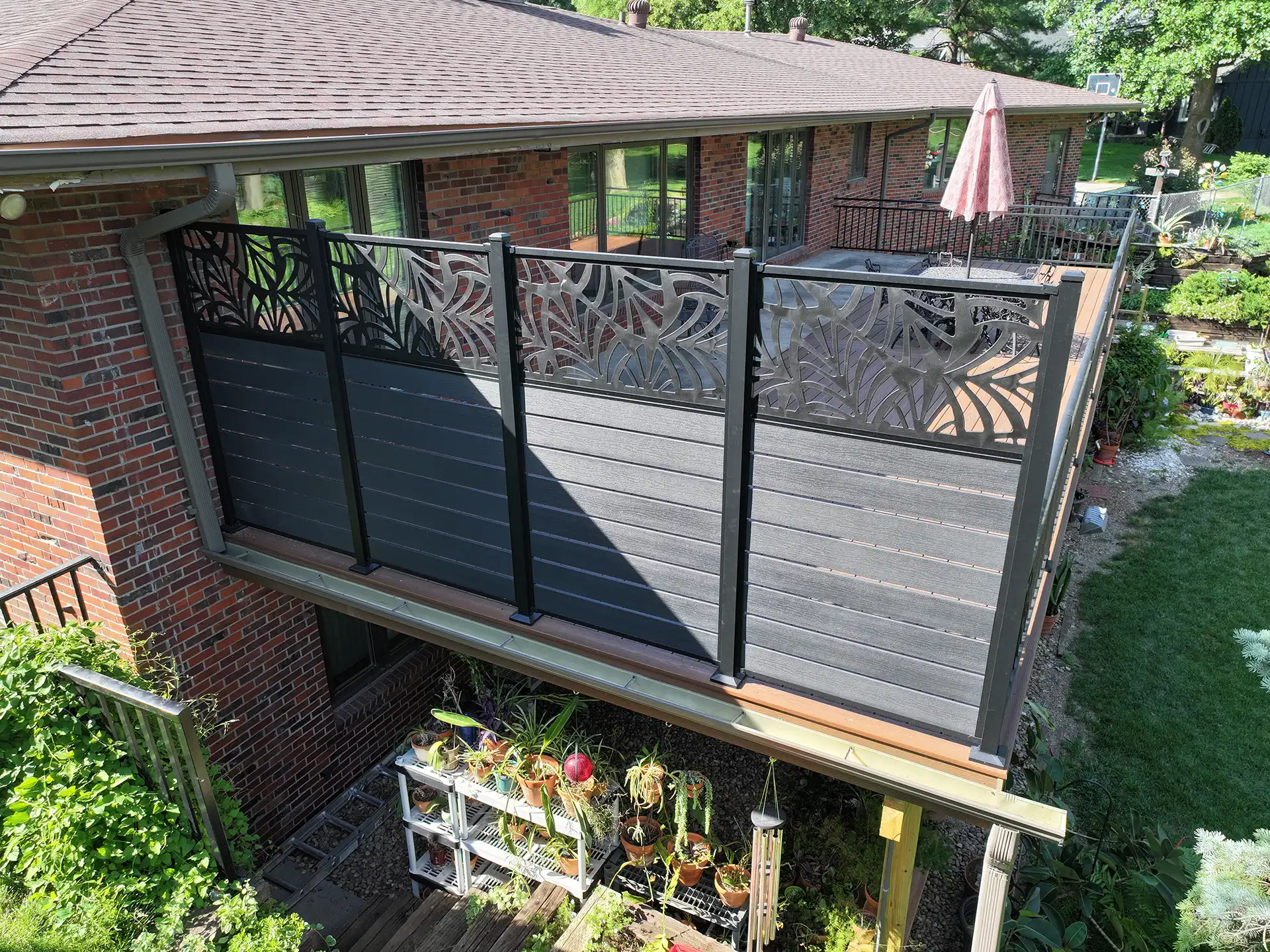 photo of an elevated deck with a privacy screen