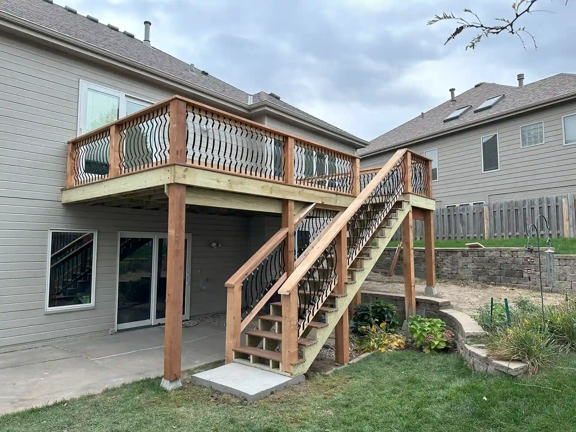 new composite deck with cedar railings