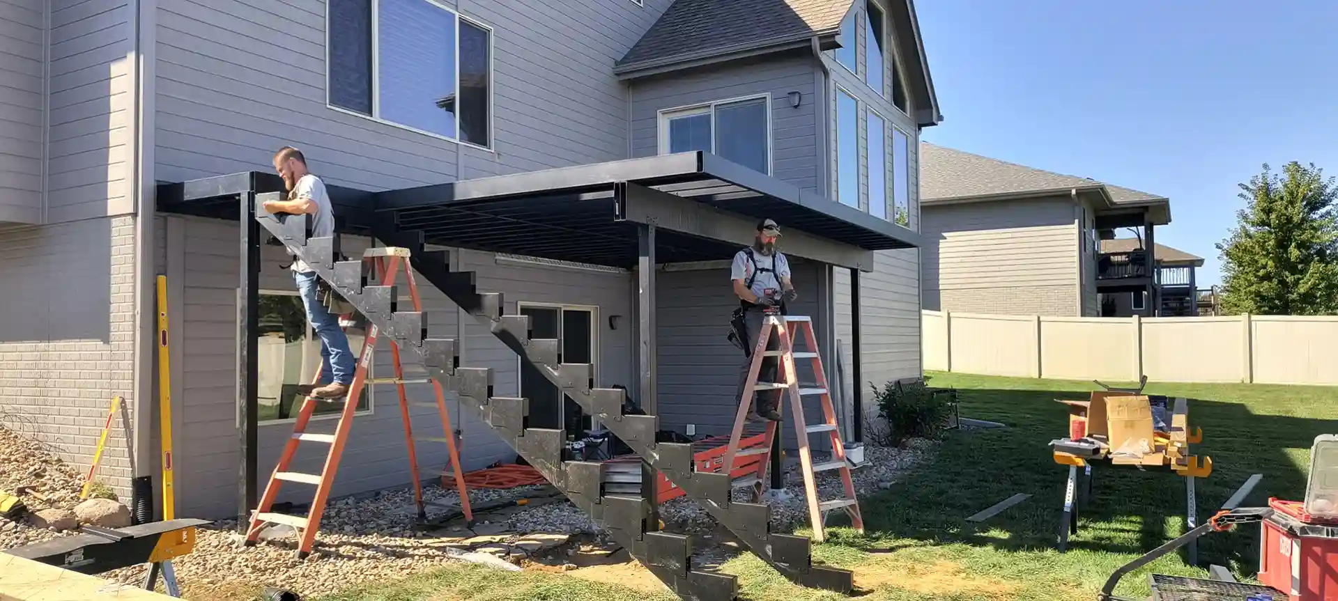 photo of a deck crew building a deck