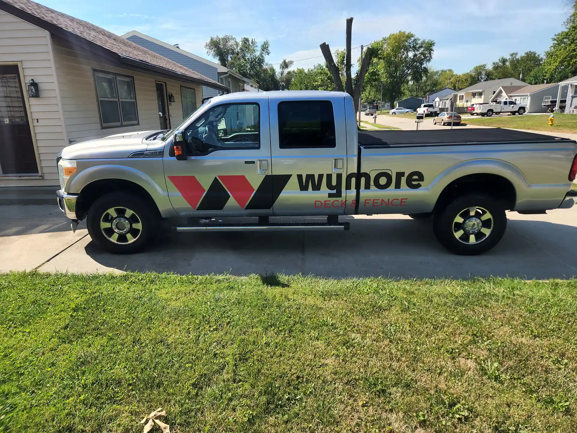 Photo of a Wymore Deck & Fence pickup truck for a deck project in Elkhorn