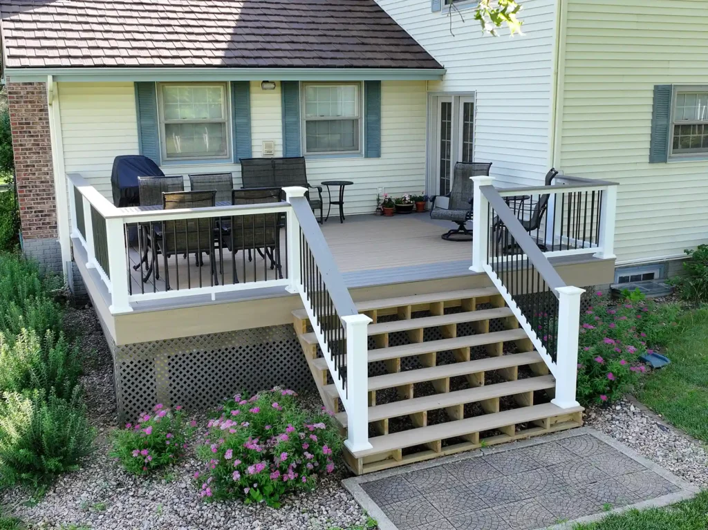 photo of a raised deck with deck railing, deck lattice skirting, and deck steps