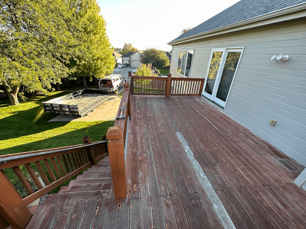 photo-of-a-deck-showing-signs-of-wear-and-tear - Deck maintenance tips for omaha ne